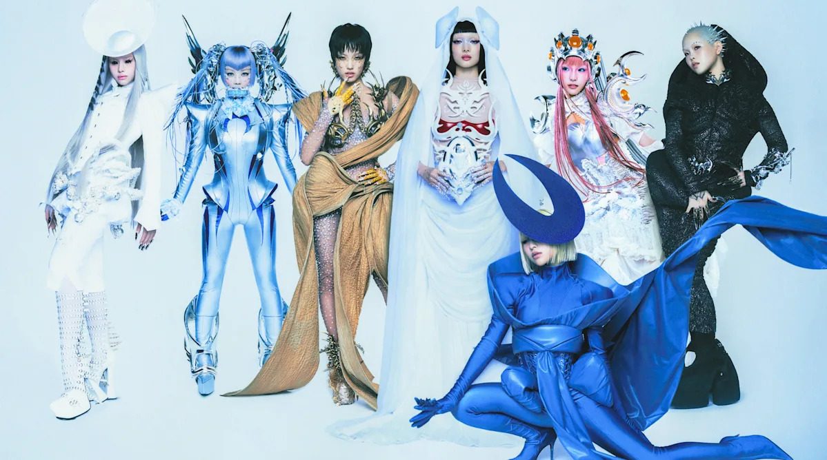 XG seven-member group in colorful avant-garde outfits, official promotional photograph