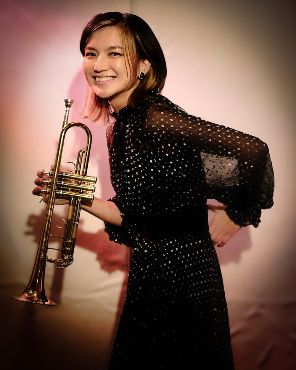 Chihiro Yamazaki holding a trumpet in an official portrait.